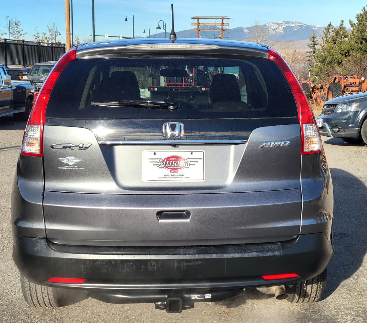 2012 Grey /Gray Honda CR-V EX (2HKRM4H50CH) with an 2.4L I4 engine, 5 Speed Automatic transmission, located at 450 N Russell, Missoula, MT, 59801, (406) 543-6600, 46.874496, -114.017433 - Nice AWD SUV. Automatic Transmission. Air. Cruise. Tilt. Power Sunroof. Power Windows and Locks., AM FM CD. Backup Camera - Photo#6